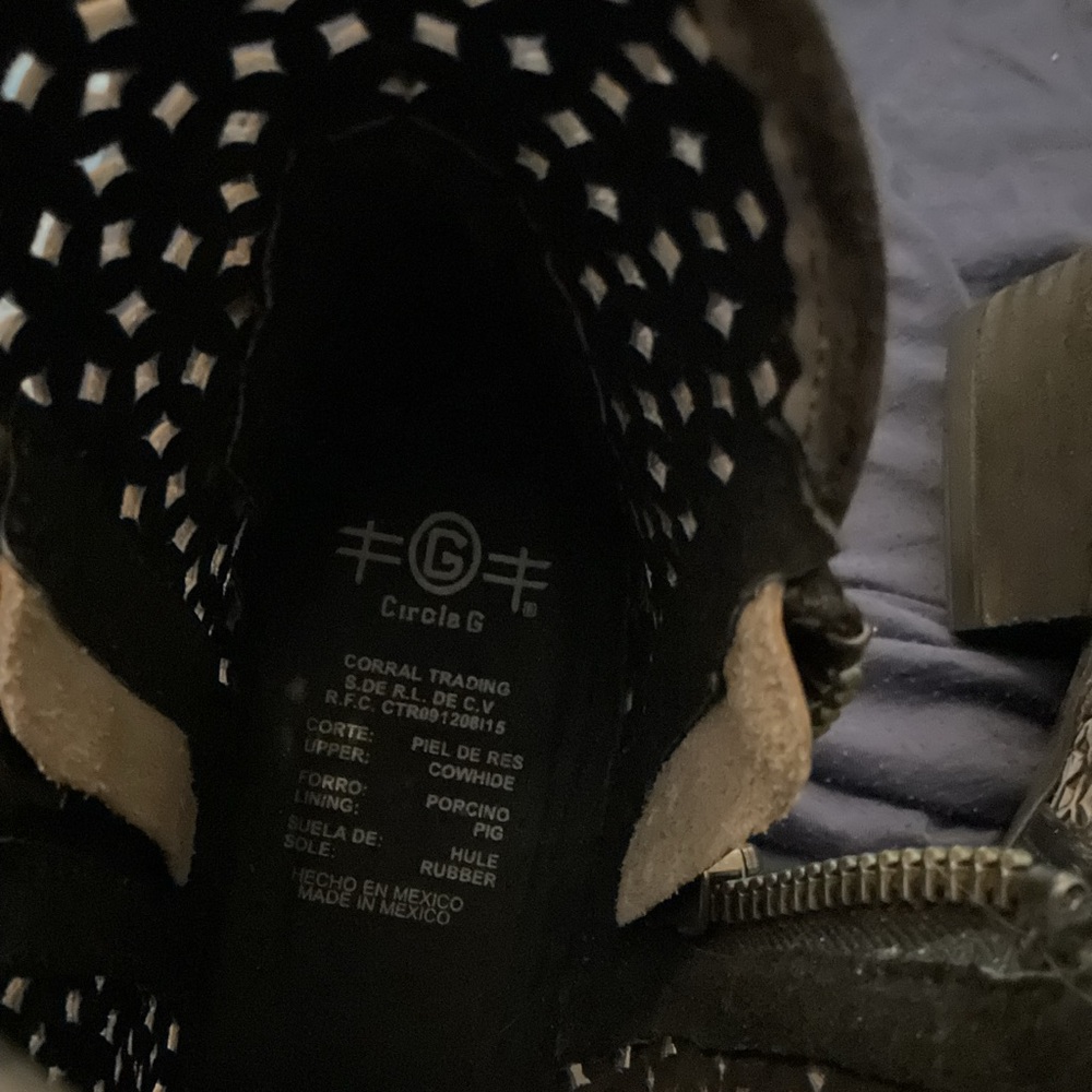 Worn once size 9.  Zippers on both sides has the worn out look. Paid 165.00